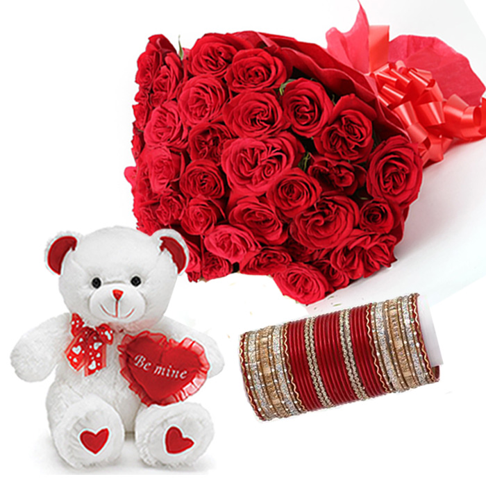 roses and a teddy bear